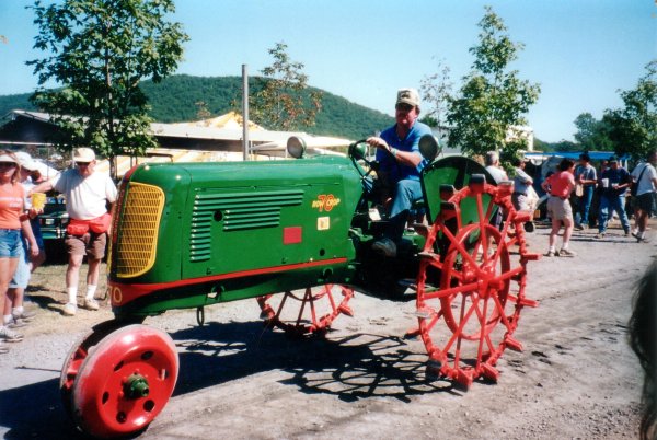 1937 Oliver 70 in parade at National Oliver show with Don at the wheel